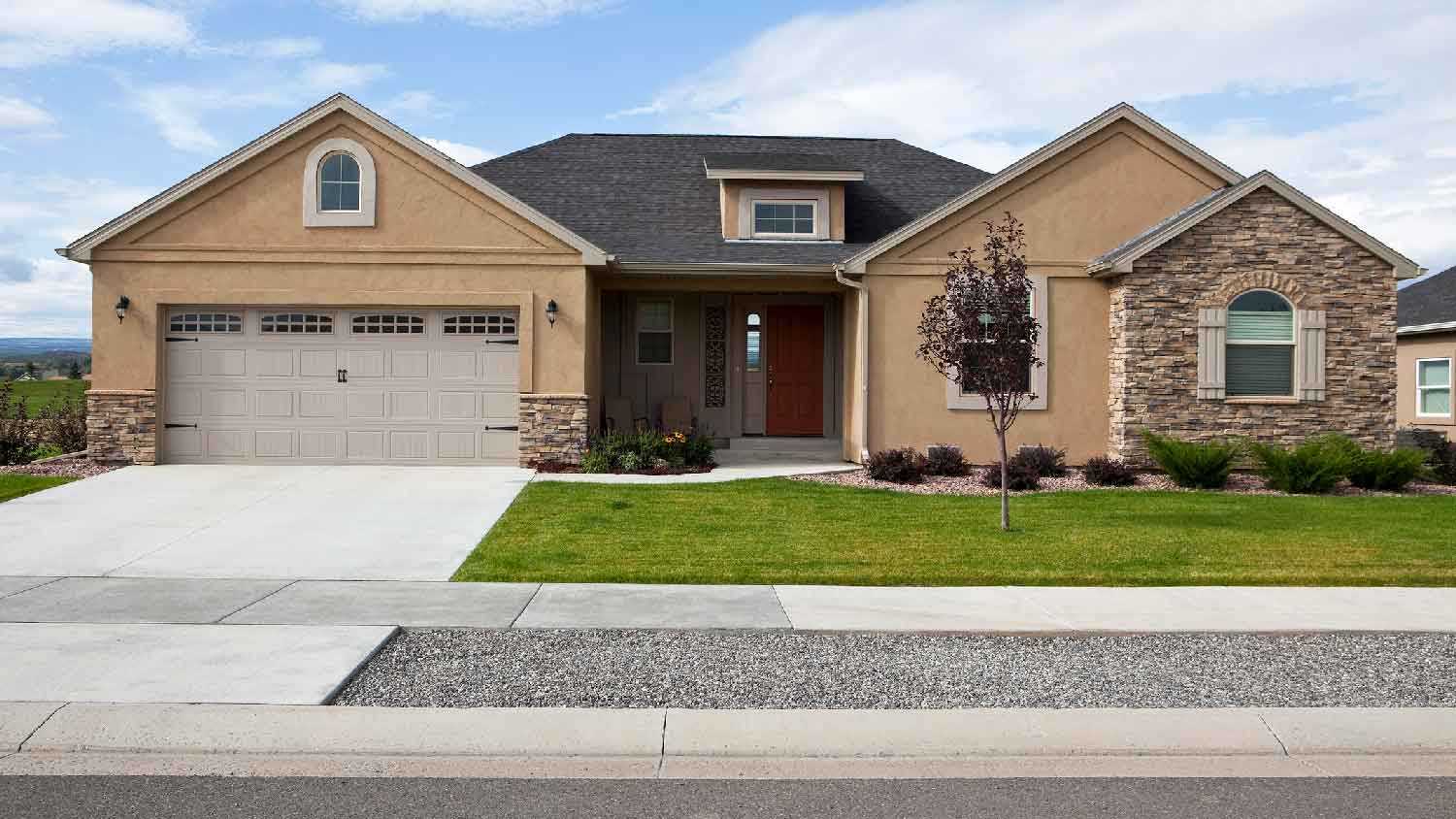 A suburban house with a garage