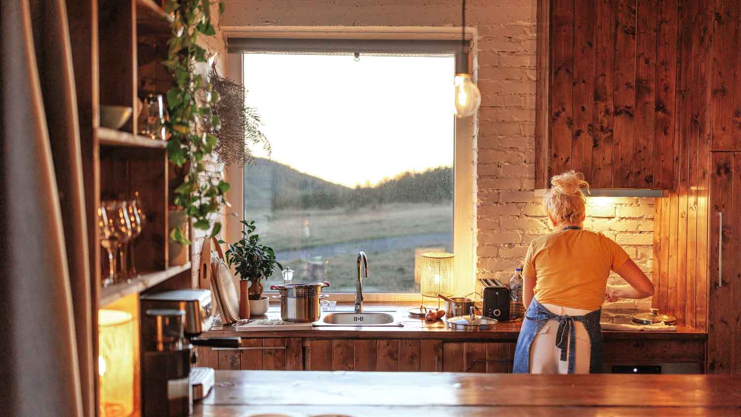 Woman making a meal in a modern kitchen