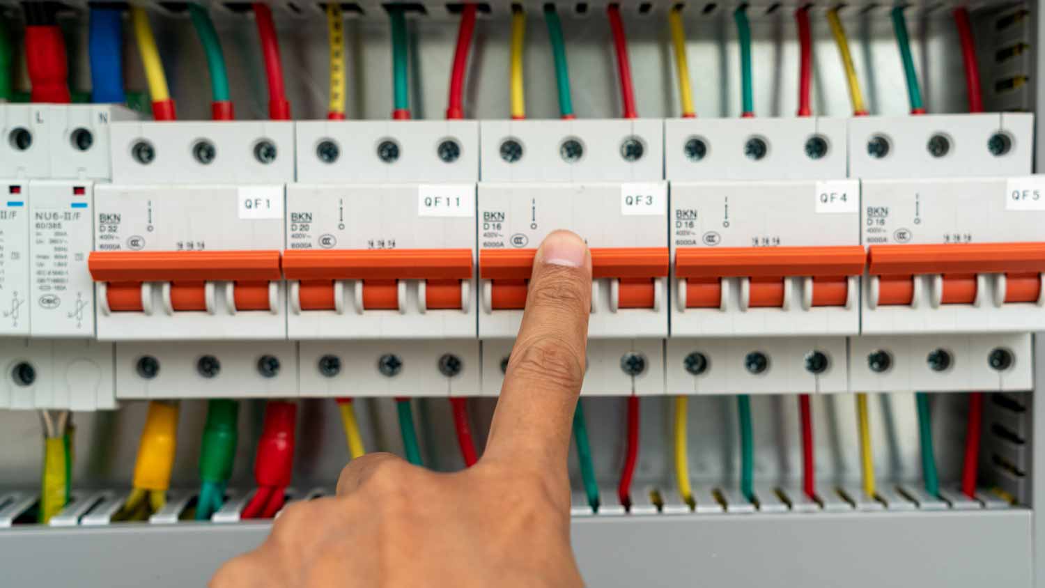 Man flipping the power switch