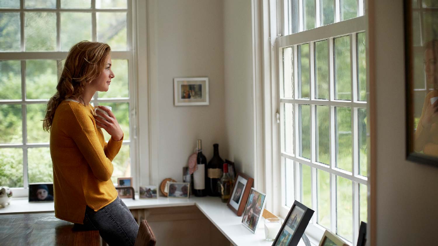 A woman looking out the window