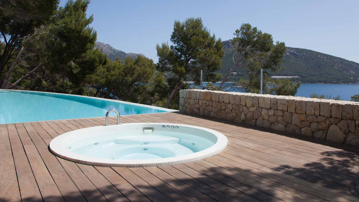 Pool and hot tub on patio