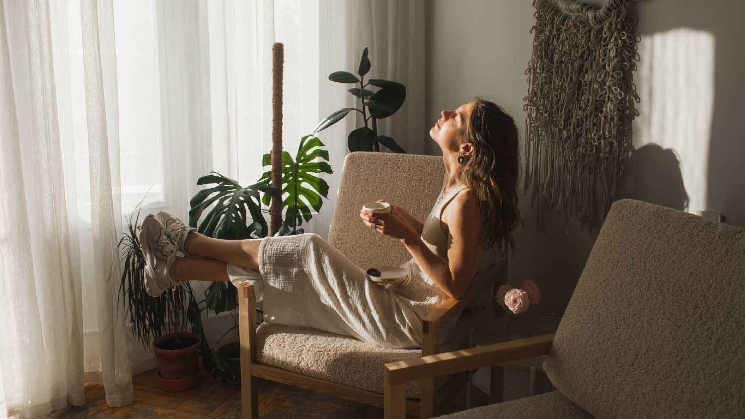 A woman relaxing in her home