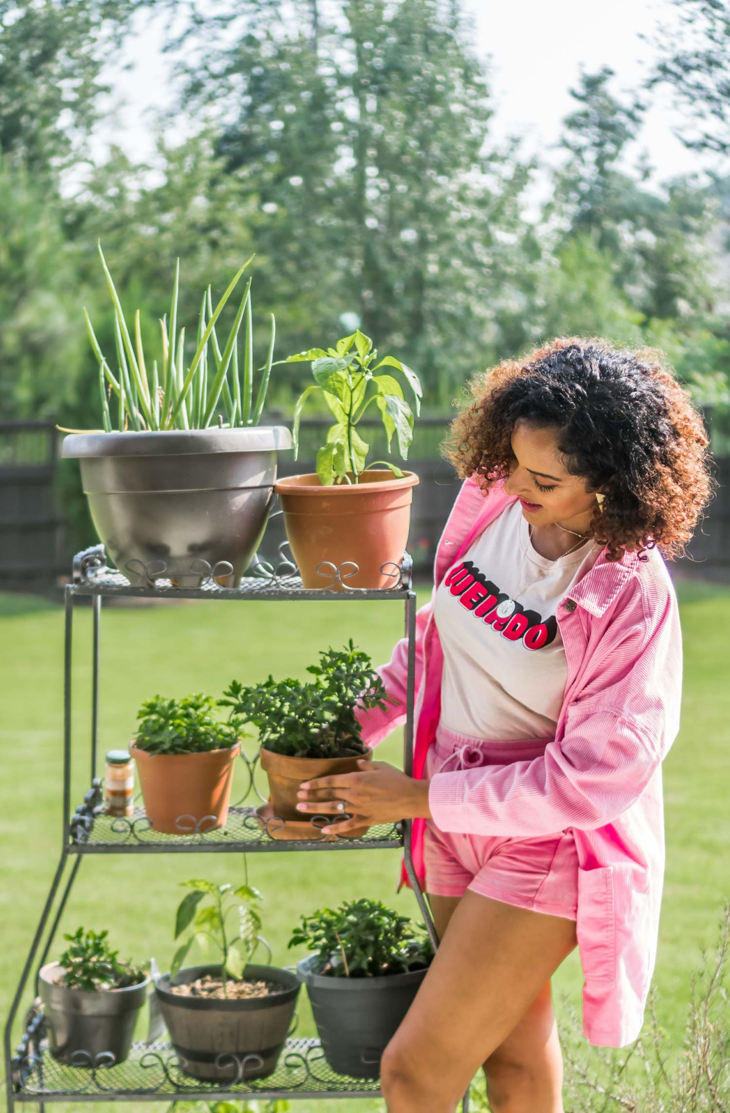Woman holding a potted plant