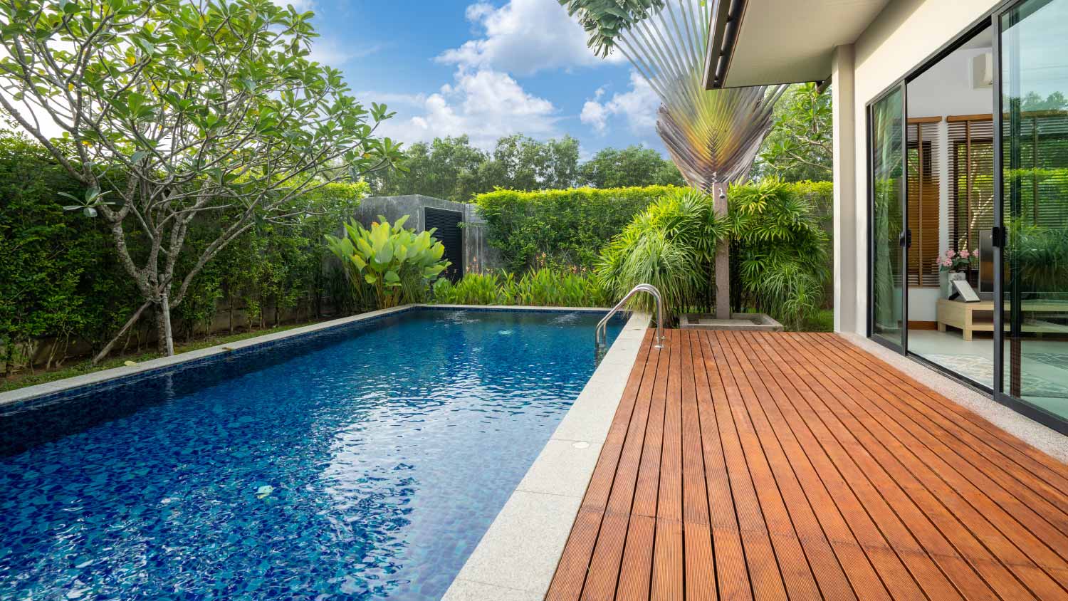 swimming pool and decking in garden