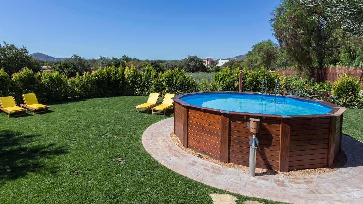 Above ground pool sets on a concrete pad