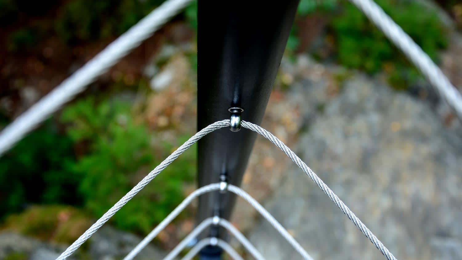 Close-up of rounded cable railing