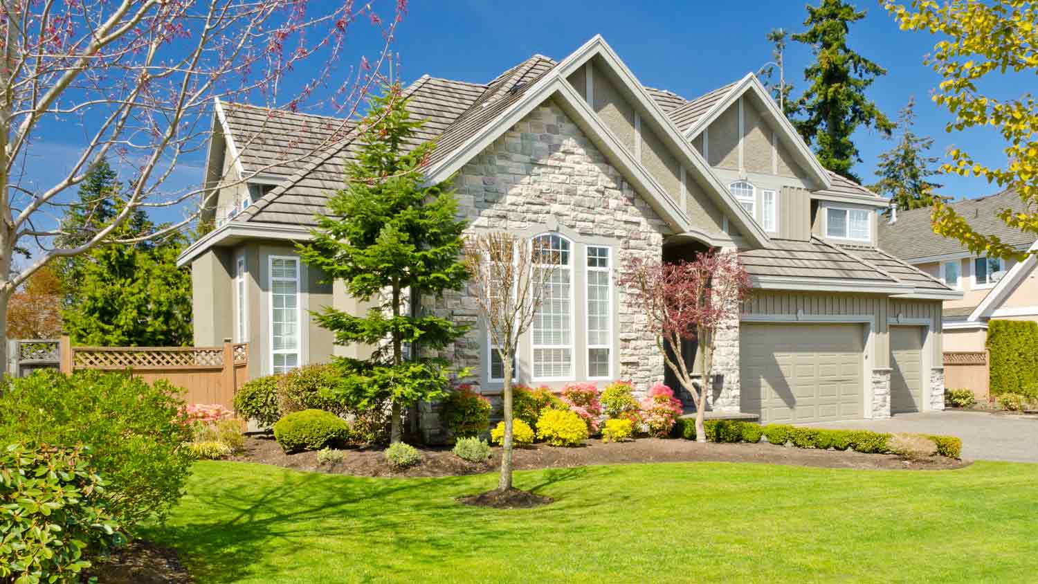 luxury house with lush lawn