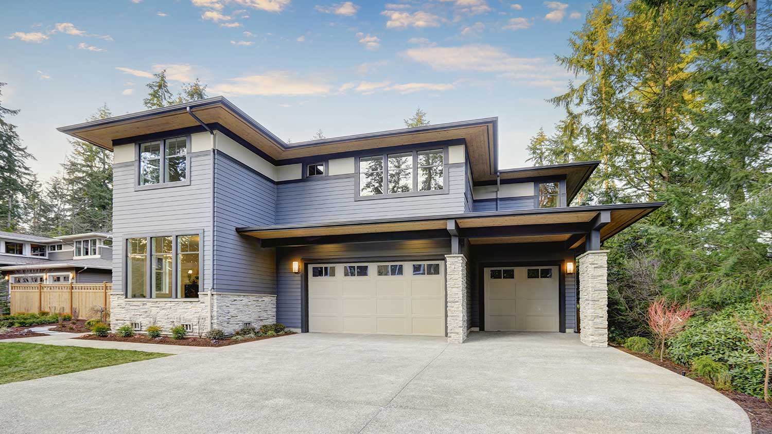 Luxurious new home with blue fiber cement siding