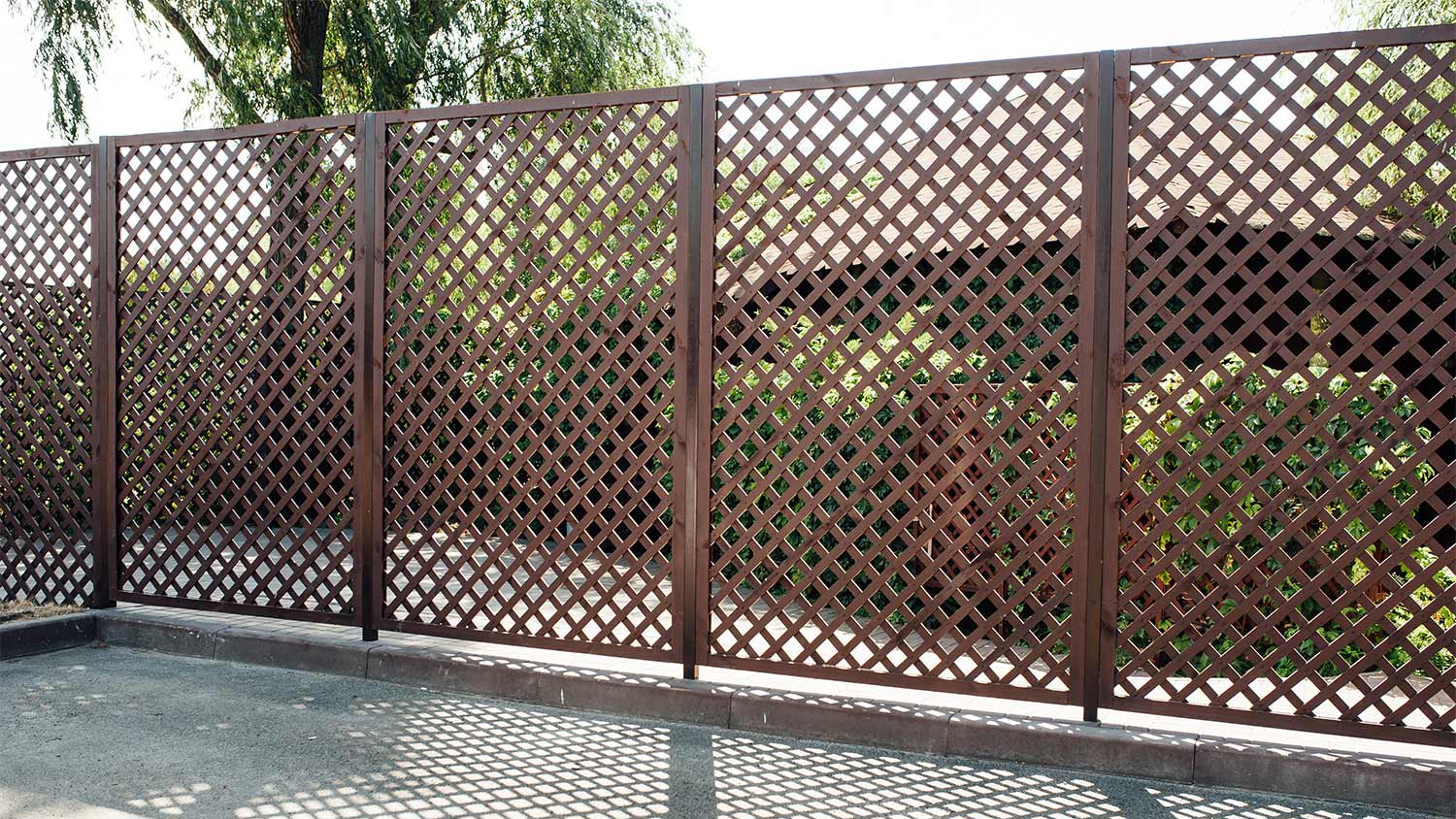 Dark brown wood lattice fence