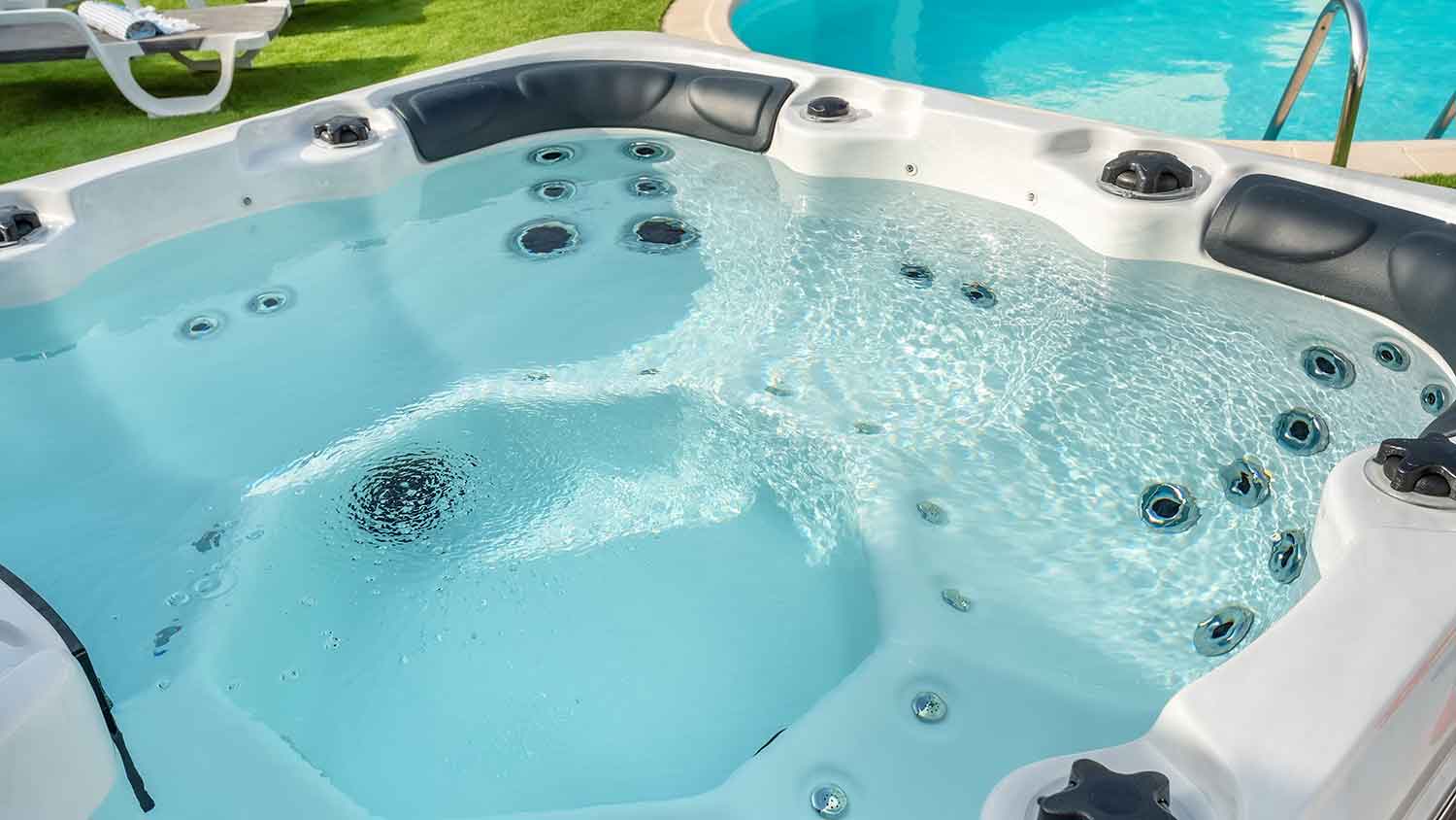 Outdoor hot tub filled with water