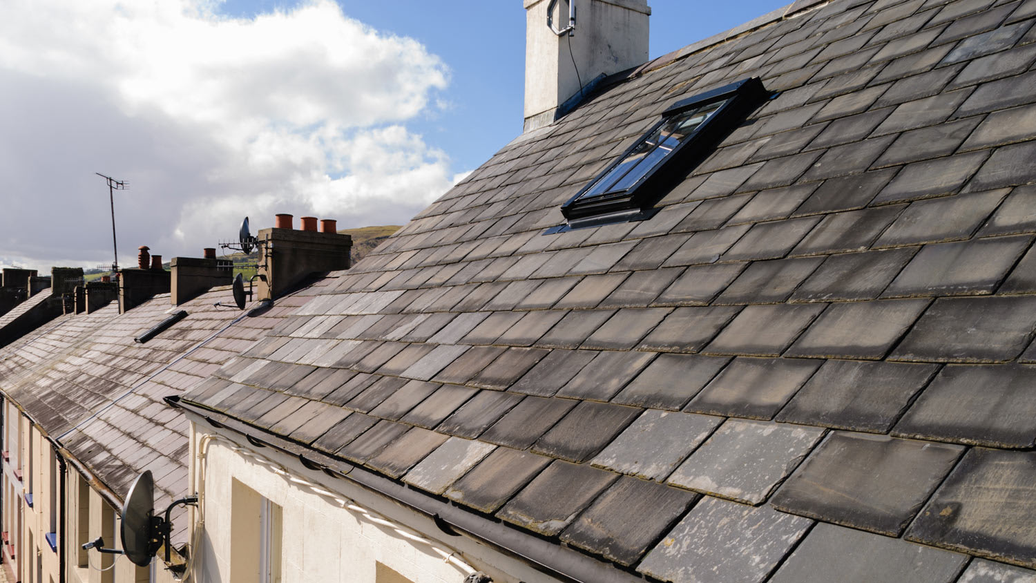 Roof tiles on a terrace row of houses.