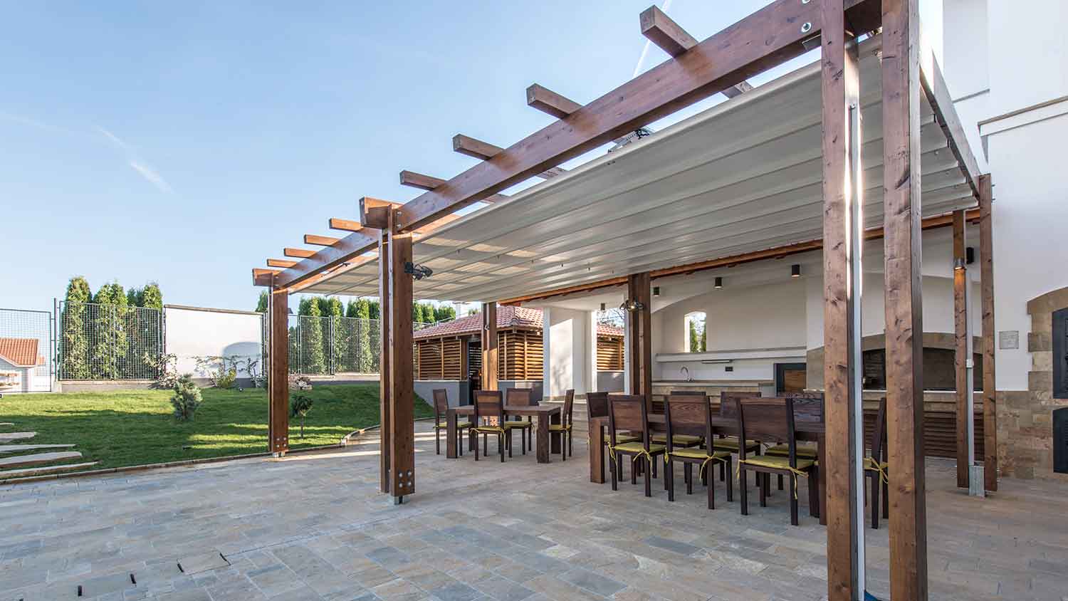Pergola with motorized roof installed on the patio