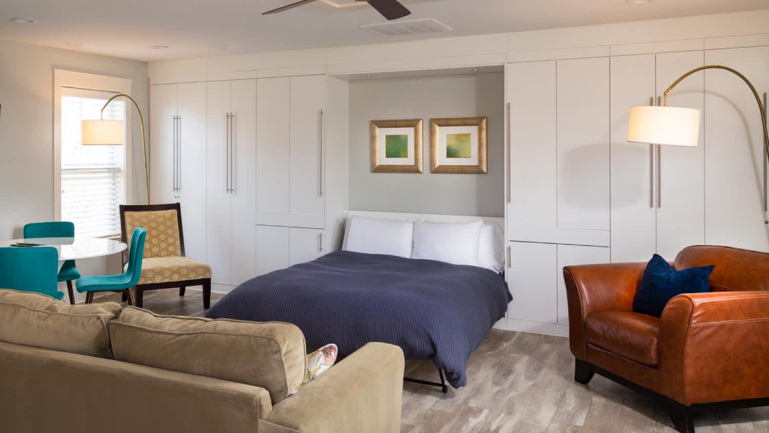 A small apartment with a murphy bed