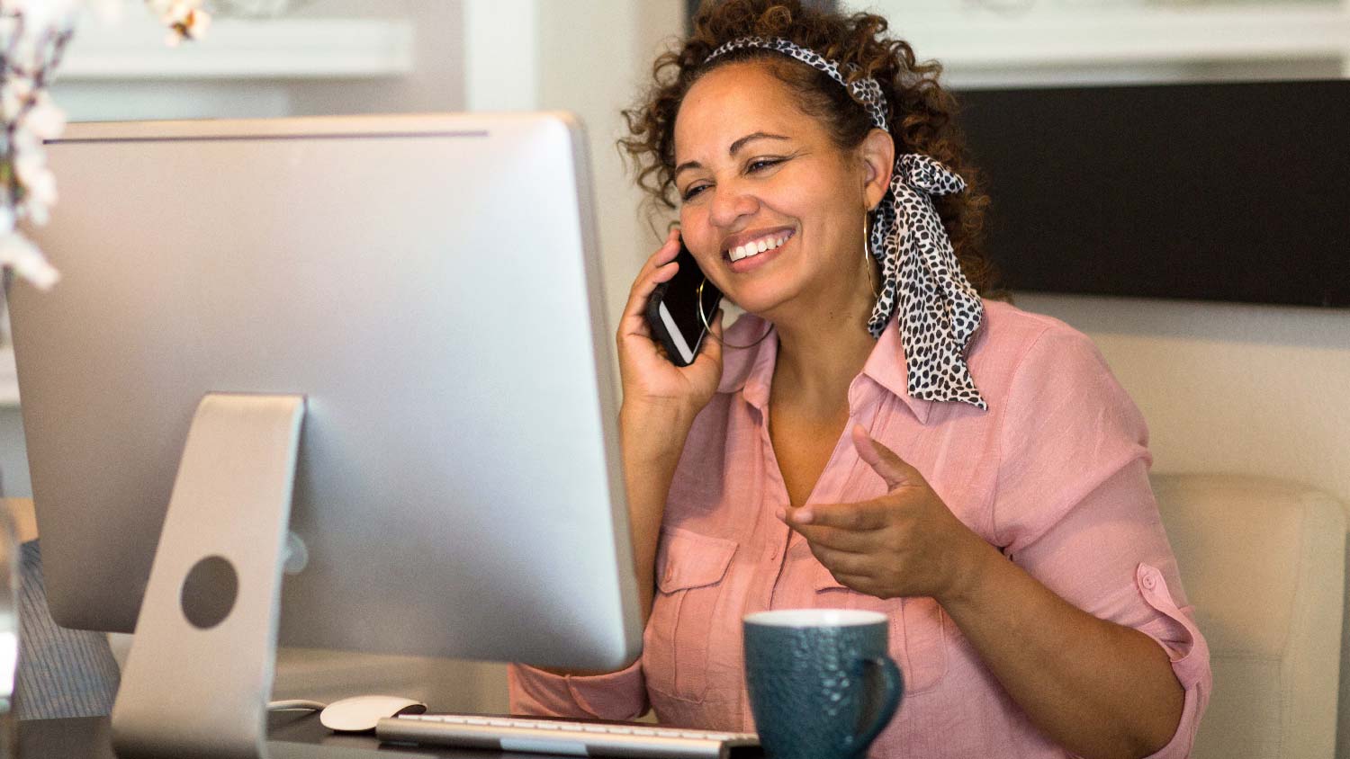 A woman working from her home office