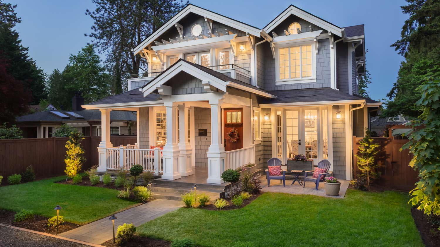 The exterior of a beautiful house at twilight