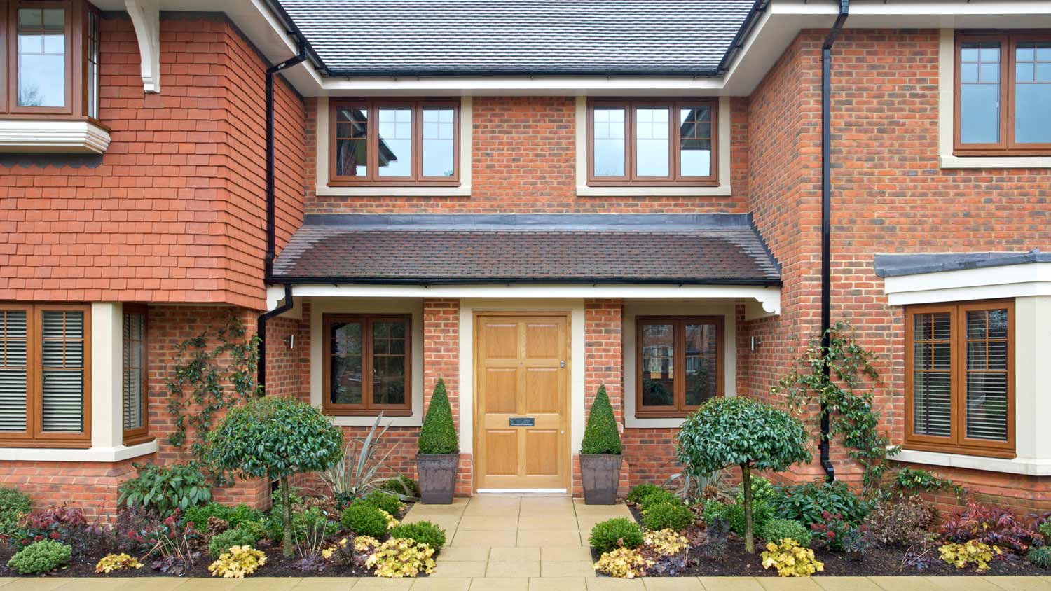 The exterior of an entrance of a modern house