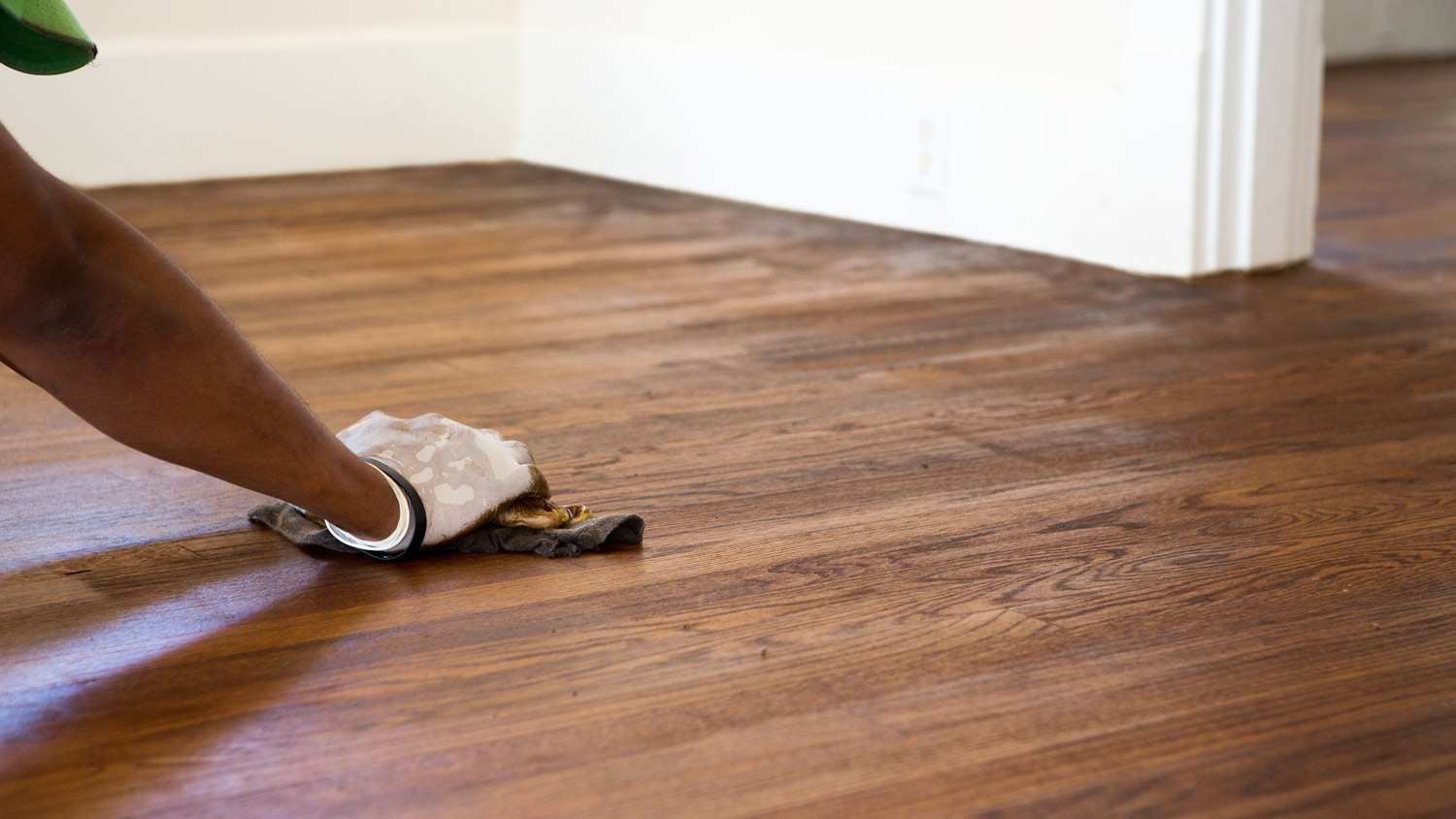A man refinished a hardwood floor