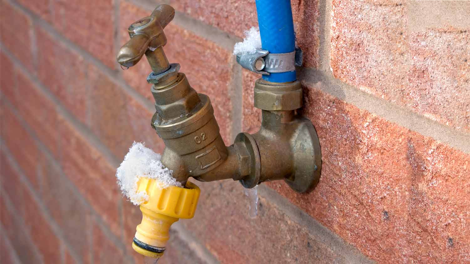 frozen outdoor tap faucet