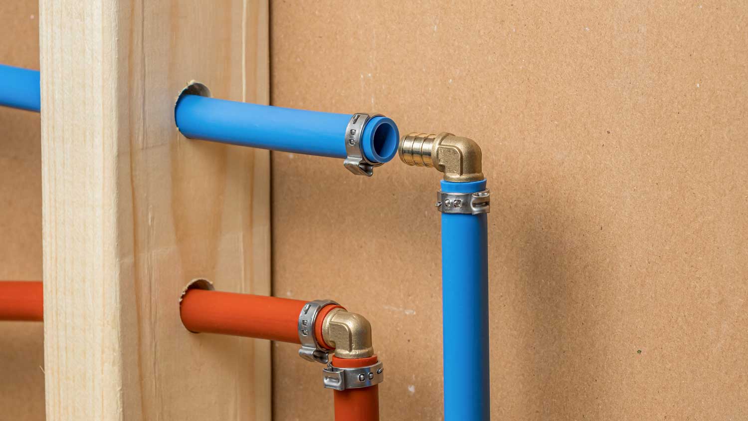 Blue and red PEX pipes for the plumbing of a house