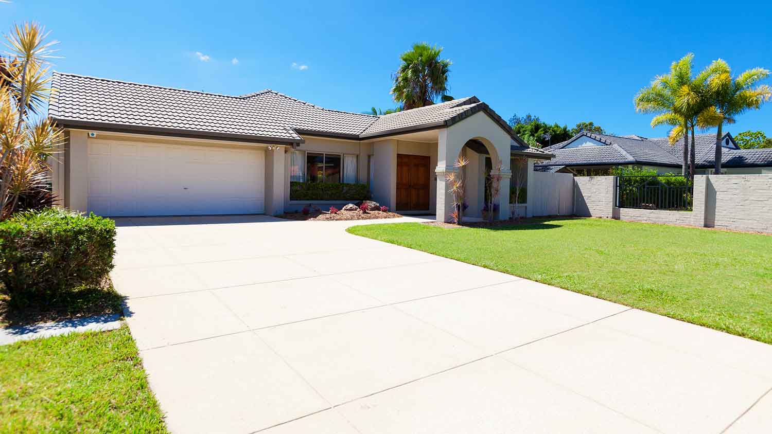 Suburban house with concrete driveway