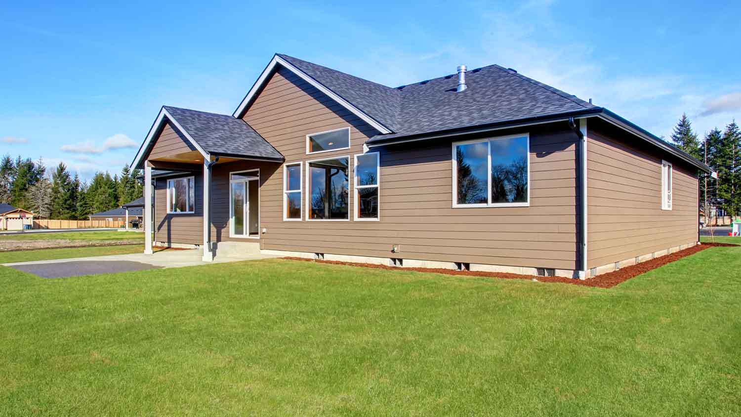 Suburban house with raised foundation and large yard