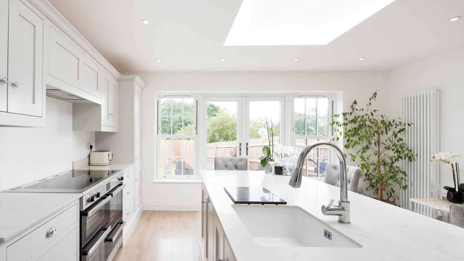 A general interior view of a domestic gray kitchen