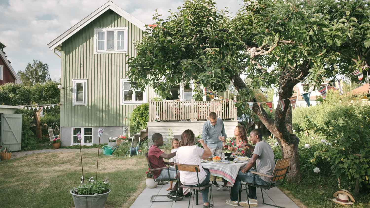 Family having a meal on the patio