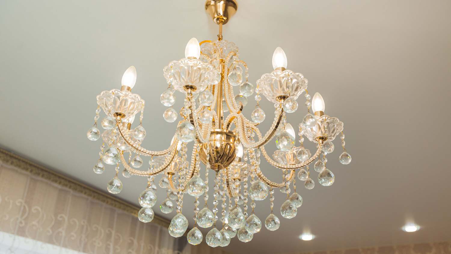 Beautiful glass chandelier in the room