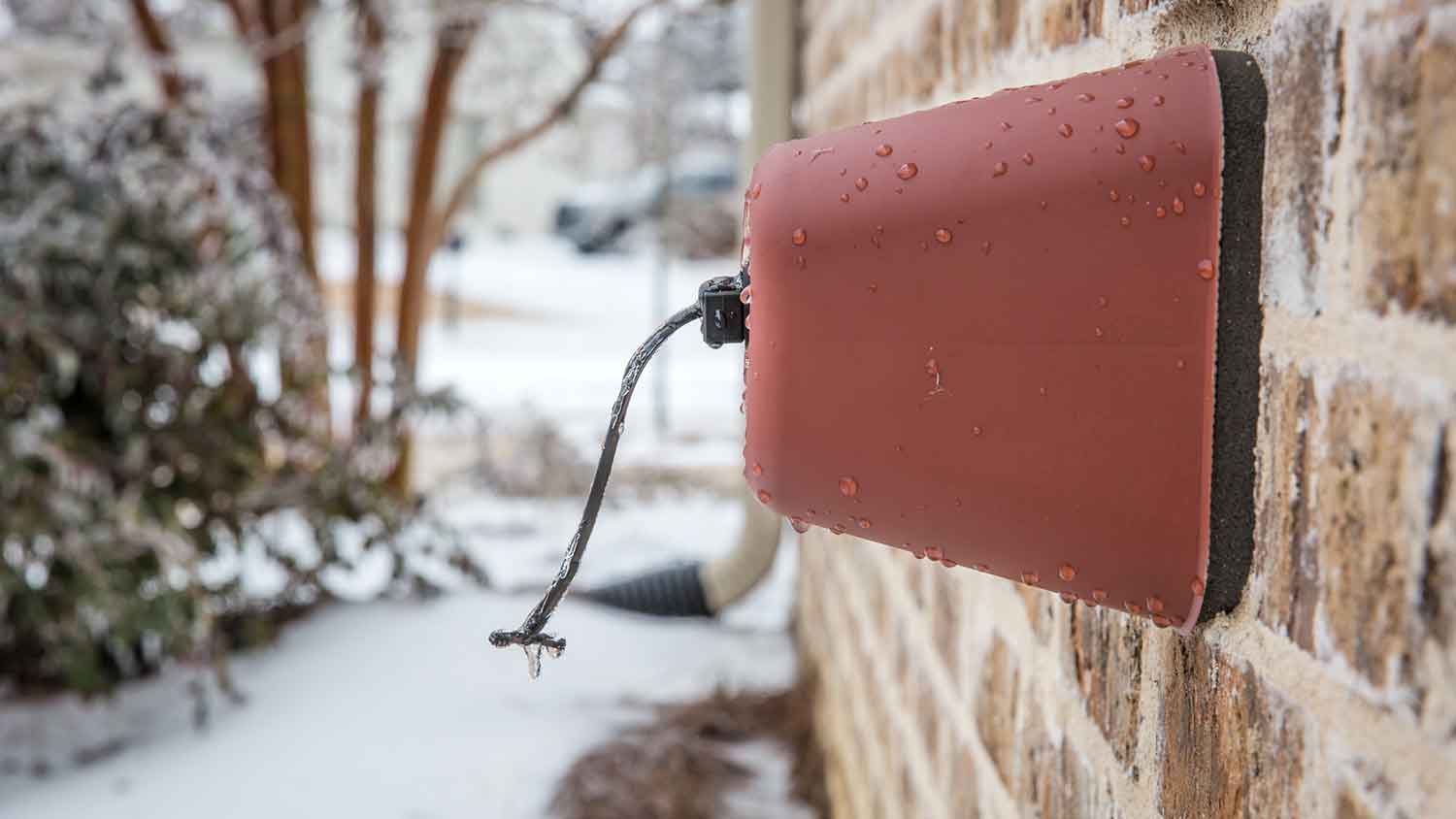 Outdoor faucet cover in the winter