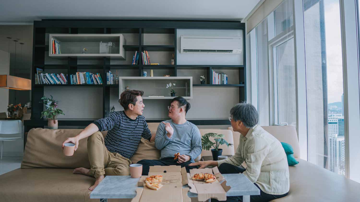 Family having lunch in the living room