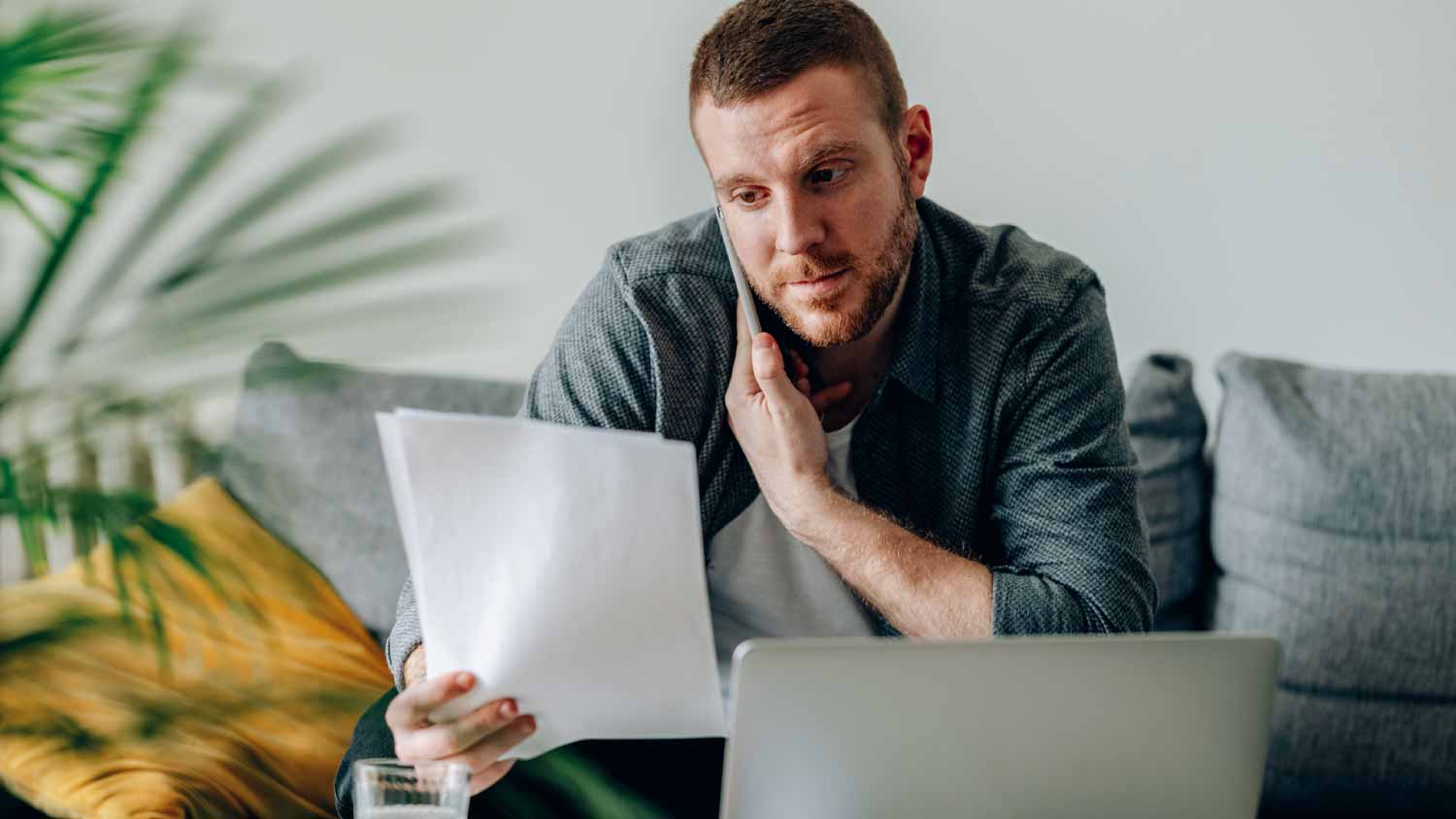 Man having a phone call at home