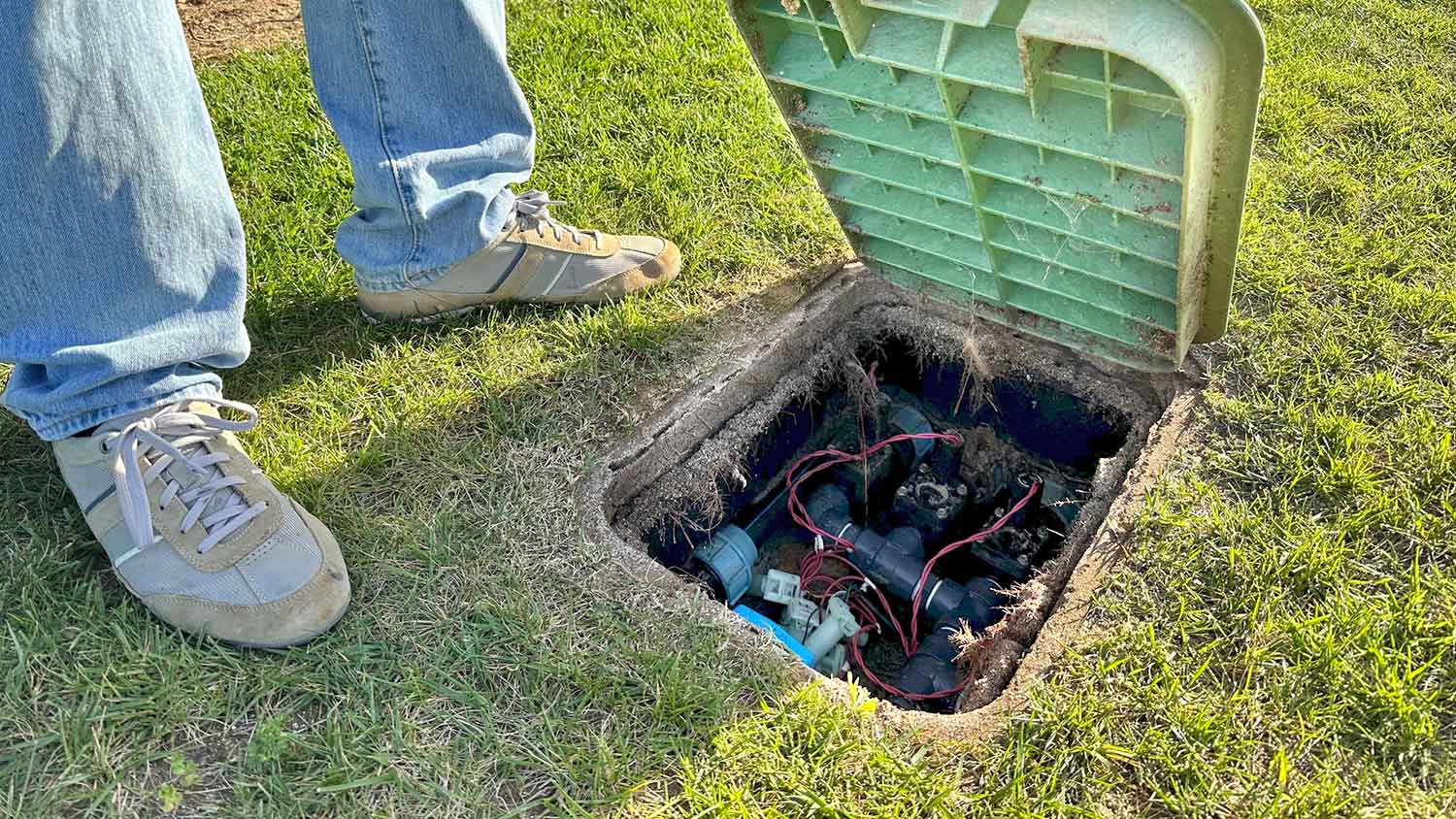 Gardener opening sprinkler system control box