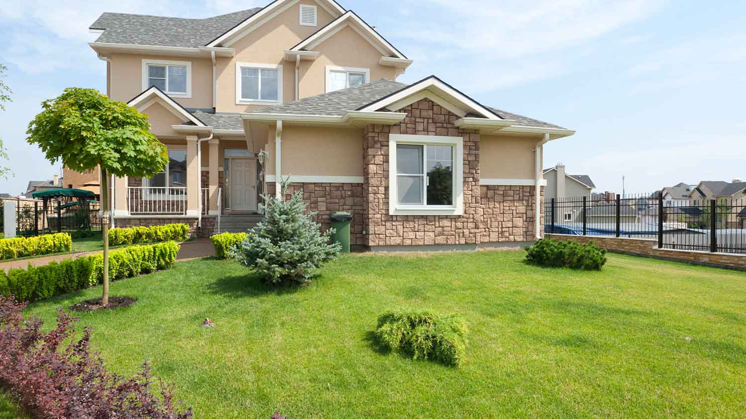 Suburban home with well-maintained lawn