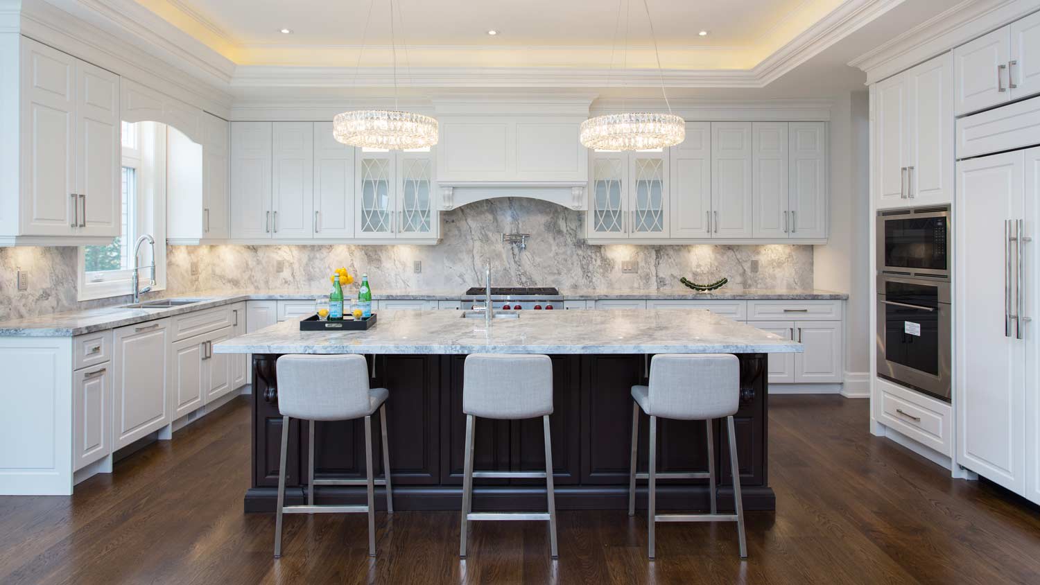 modern kitchen with chandeliers