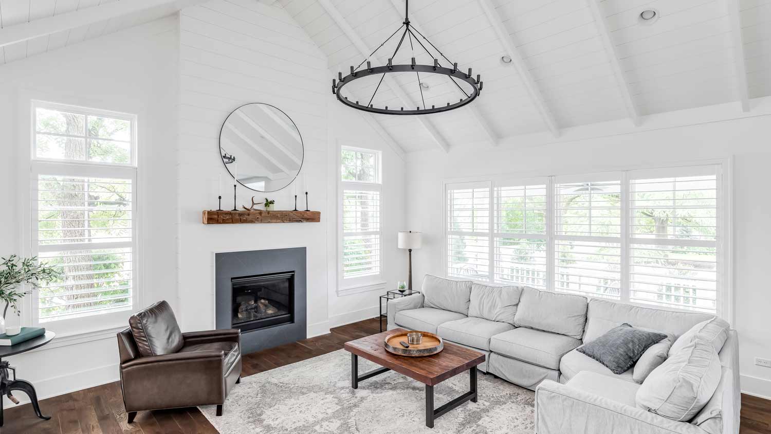 white farmhouse with chandelier