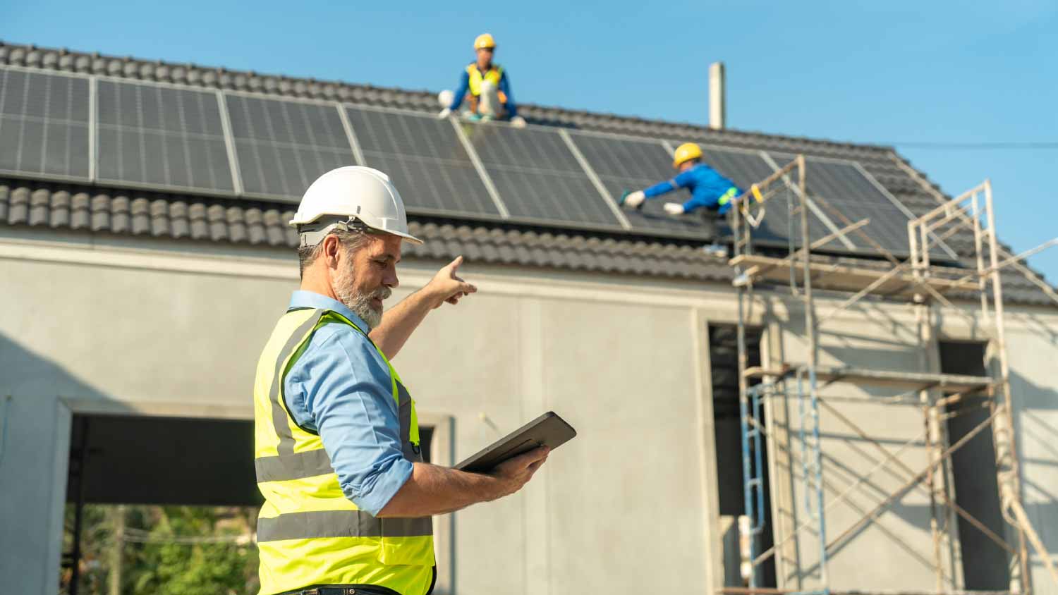 A construction manager overseeing construction work