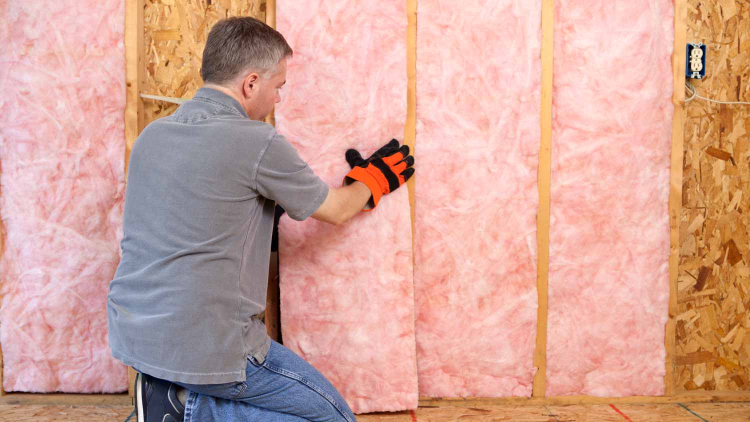 Man Installing Insulation