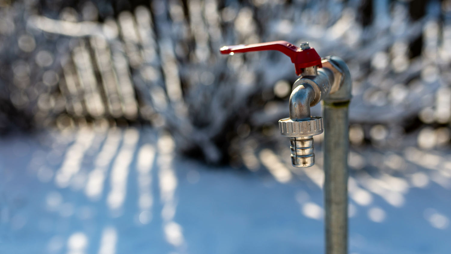 outdoor faucet in the wintertime