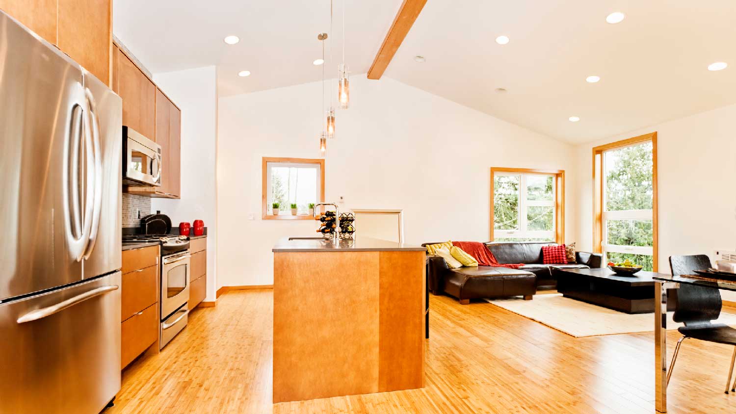 An open space interior with recessed can lighting