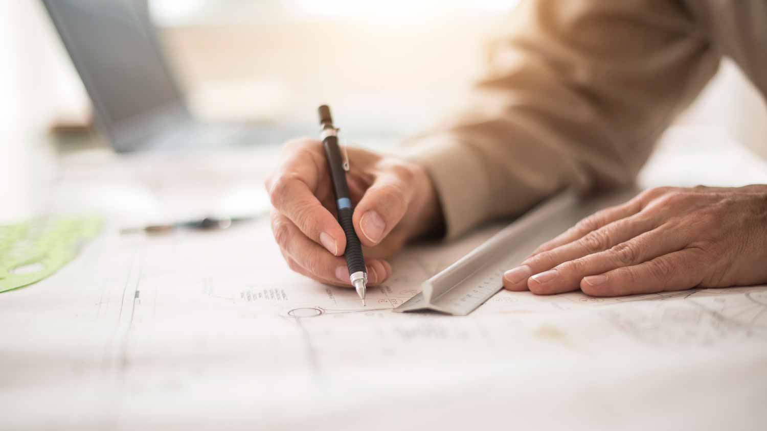Close up of architect drawing