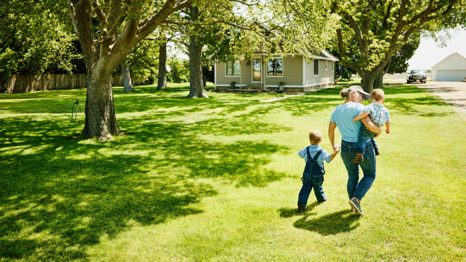 Grandmother walking with grandsons