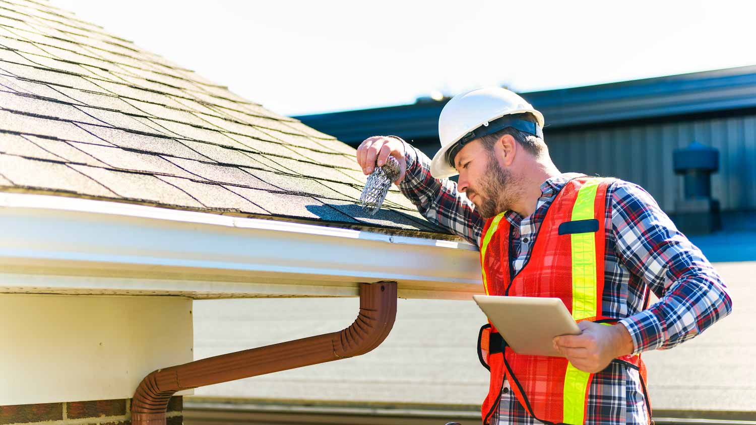 Man inspecting roof
