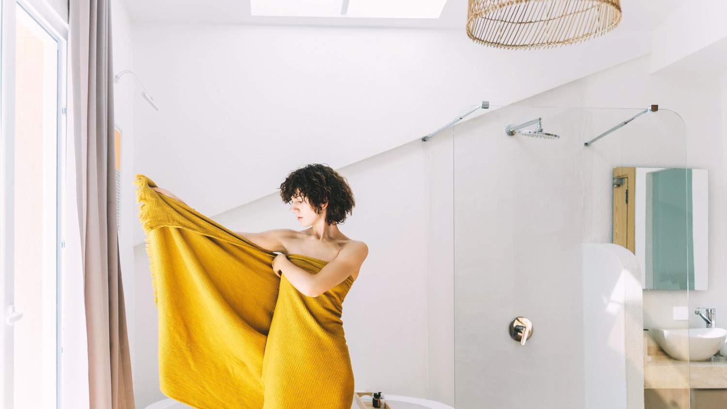 woman doing morning routine at home in bathroom