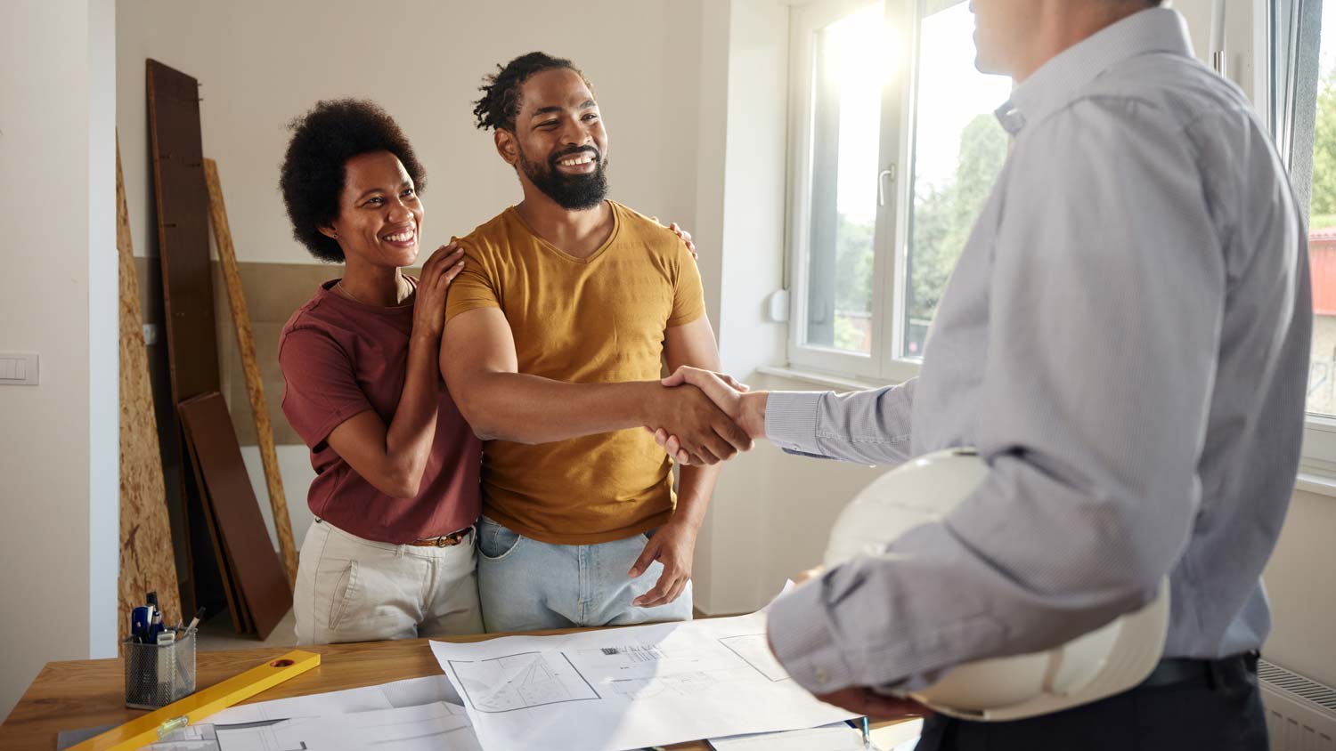 couple coming to an agreement with architect