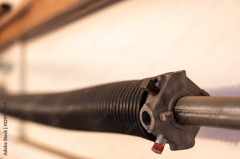 Close-up of a garage torsion spring