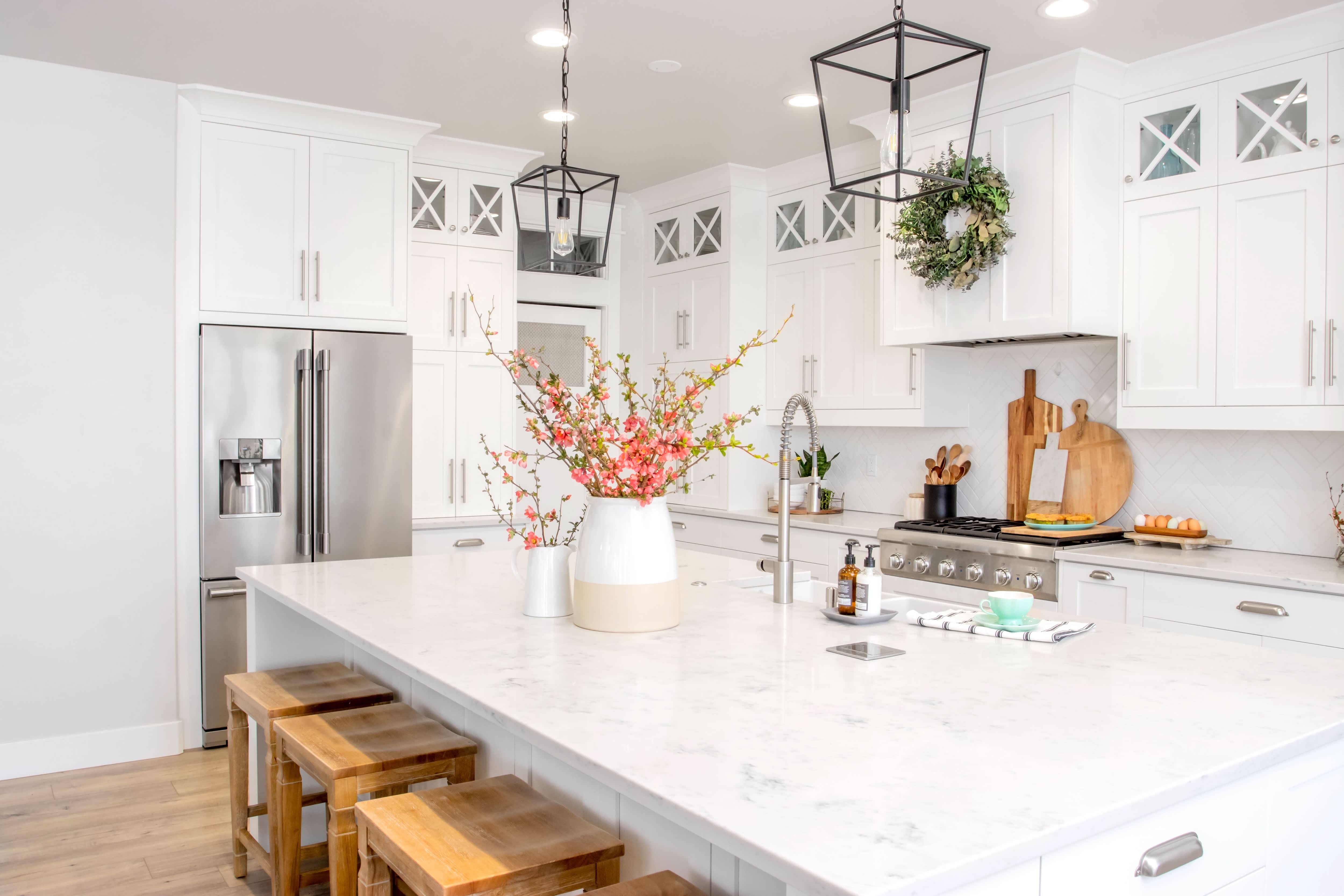 All white modern farmhouse kitchen with quartz countertops