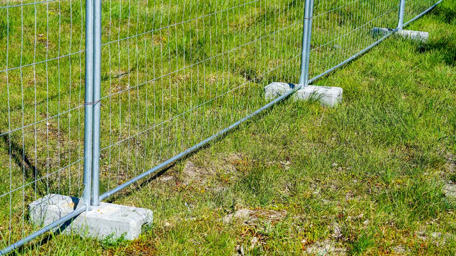 Portable wire fence on lawn