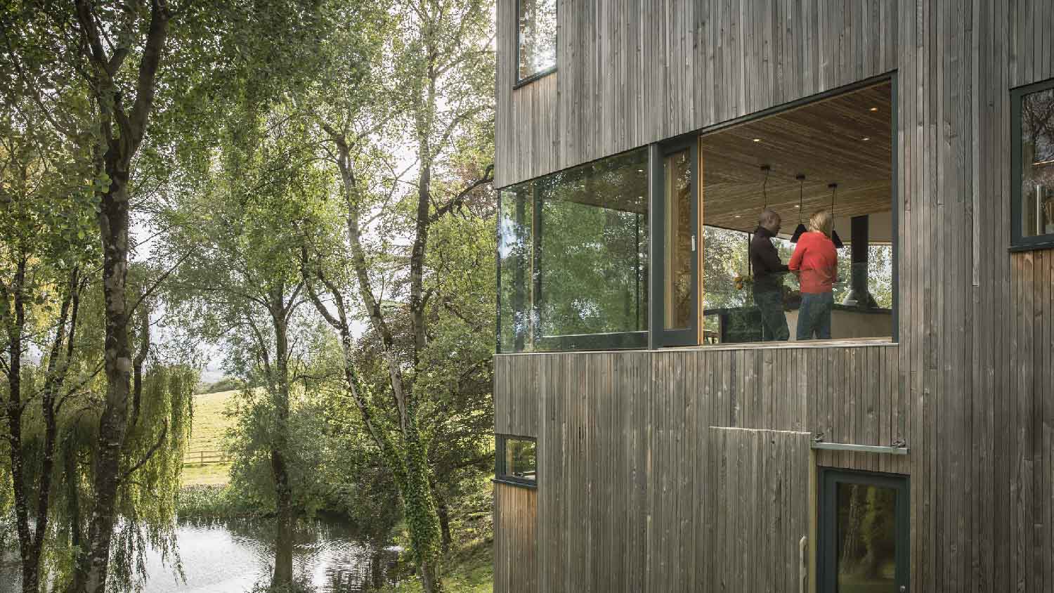 People discussing in the interior of a modern house