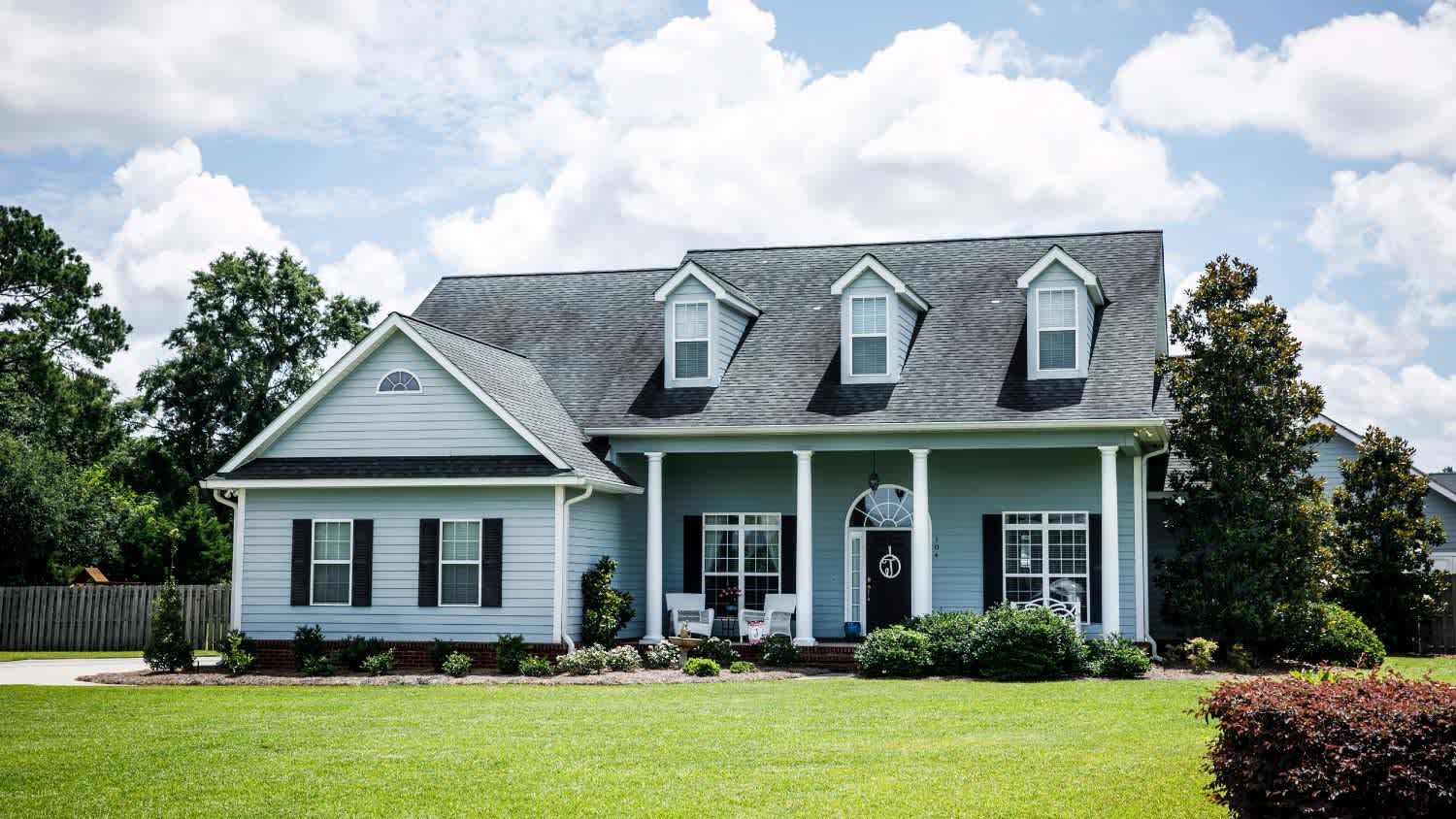 Blue traditional siding house