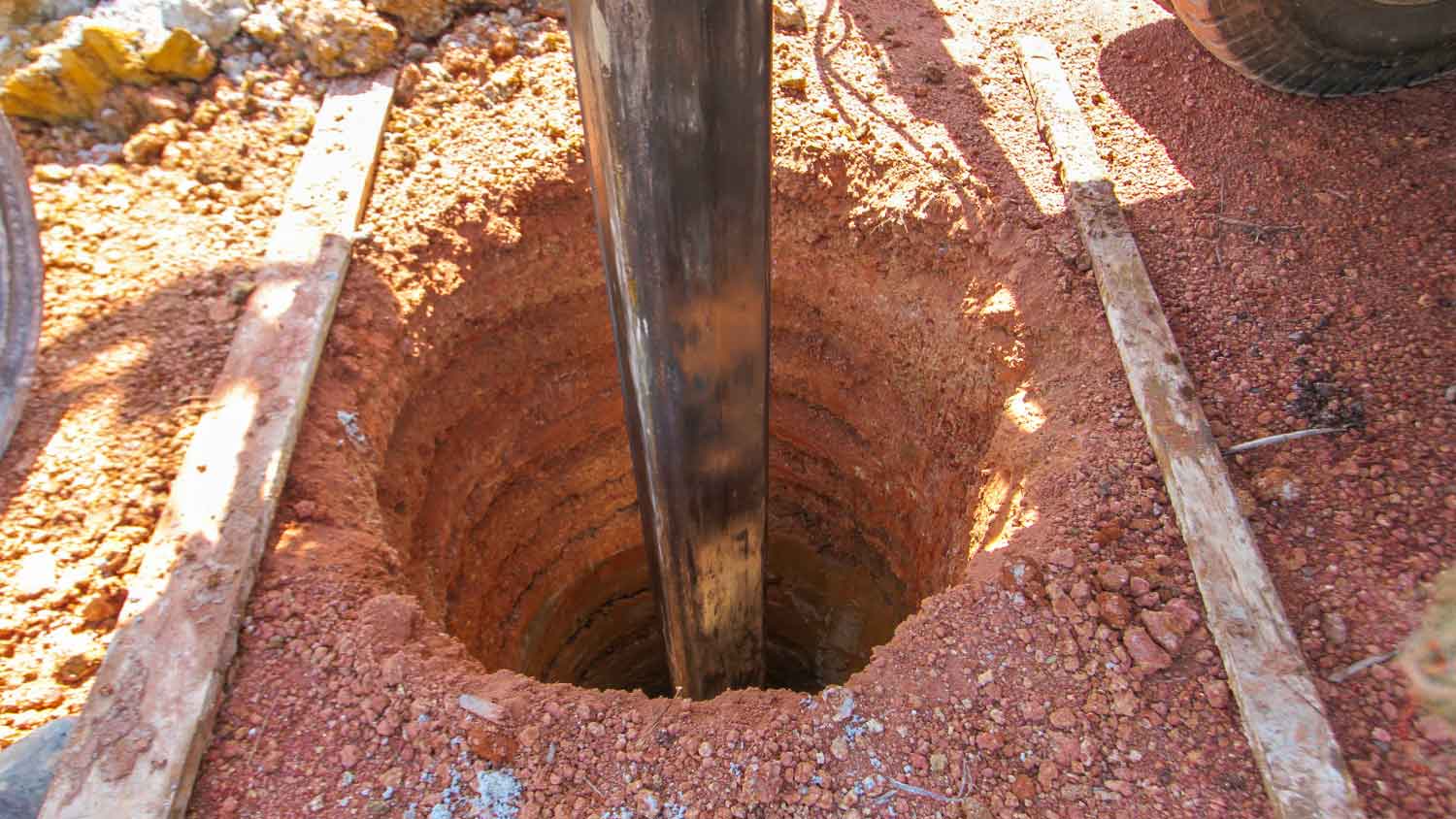 Drilling well with a drilling machine